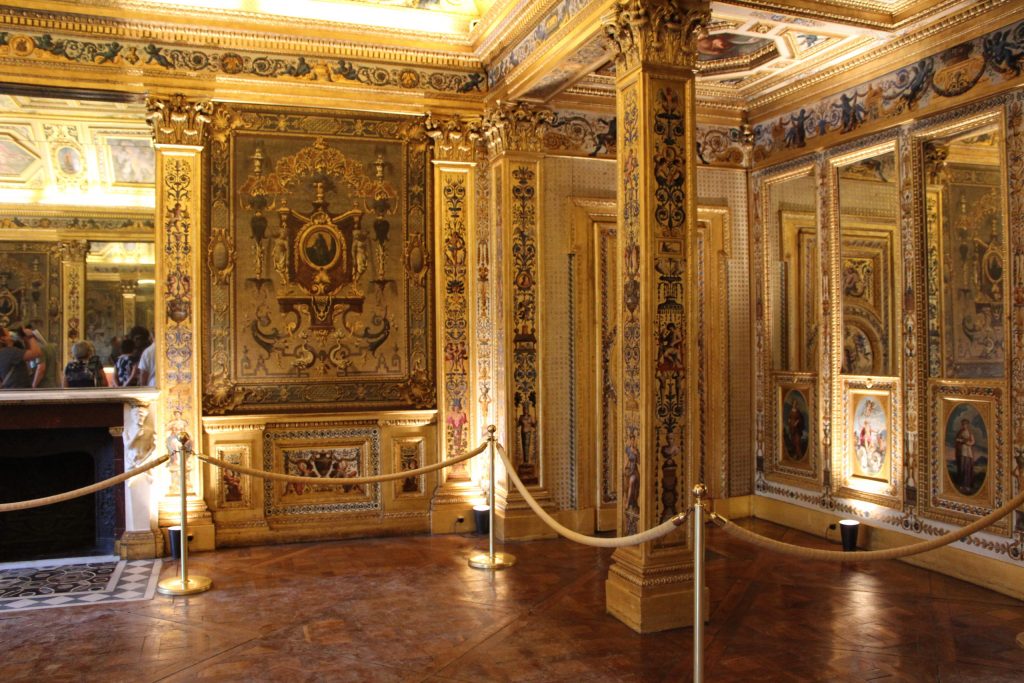 A photo of a gilded room inside the Luxembourg Palace.