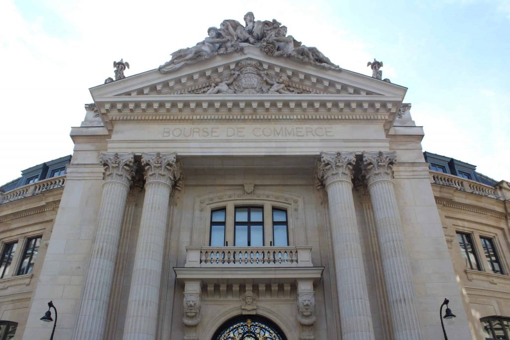 A photo of the front facade of the Bourse de Commerce.